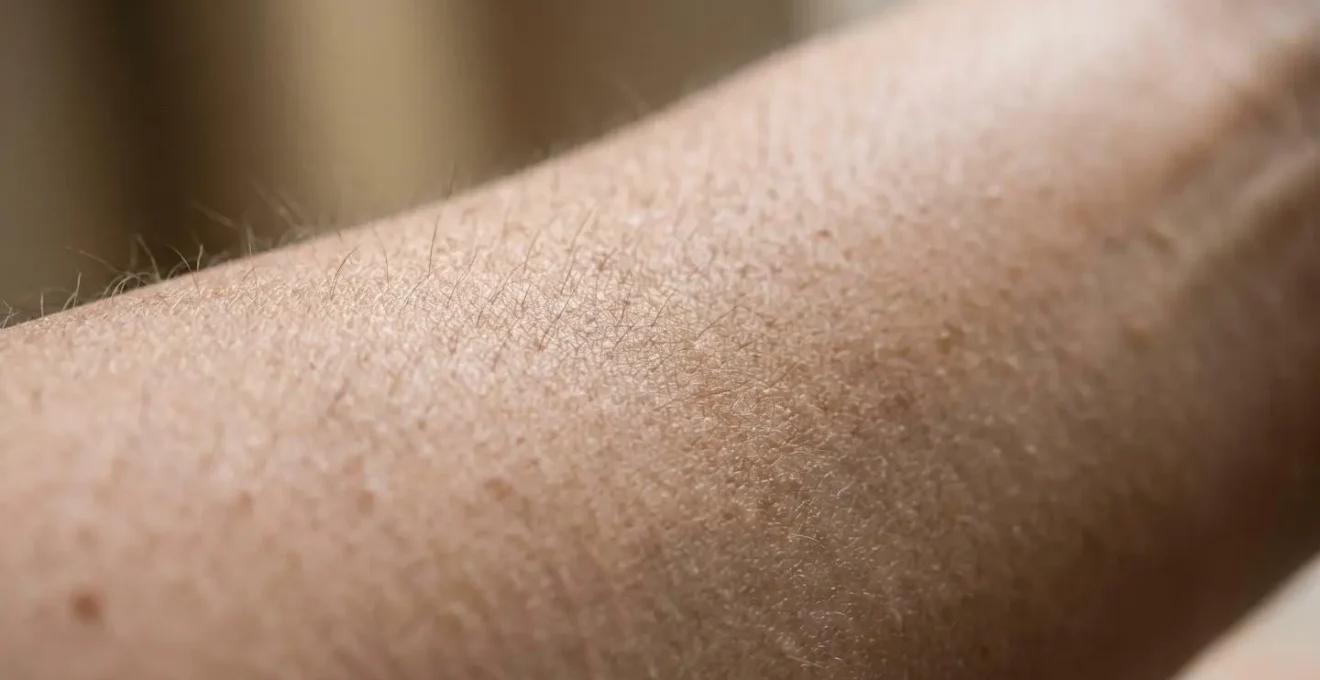 Close-up detail showing the technical challenges of capturing skin texture and color accuracy in suboptimal lighting conditions
